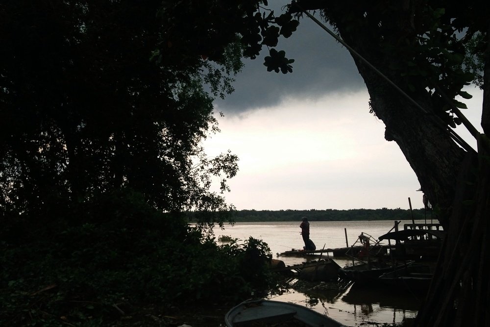Fishing Along The Perak River Before The Storm.