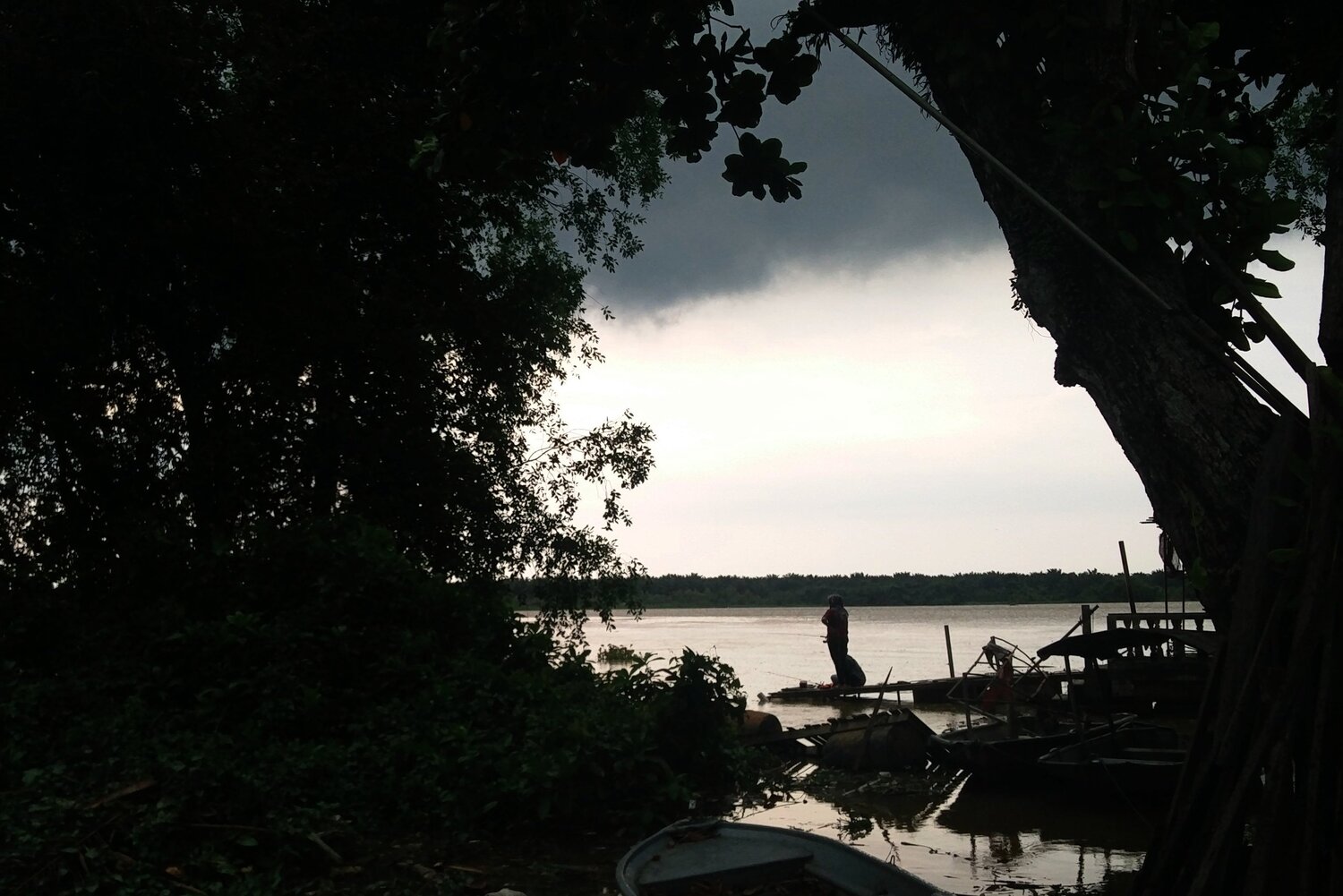 Fishing Along The Perak River Before The Storm. Fishing Along The Perak River Before The Storm.