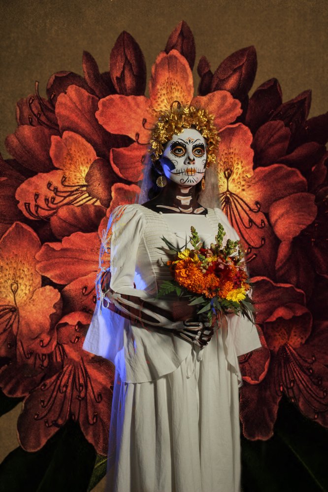 Catrina con flores.