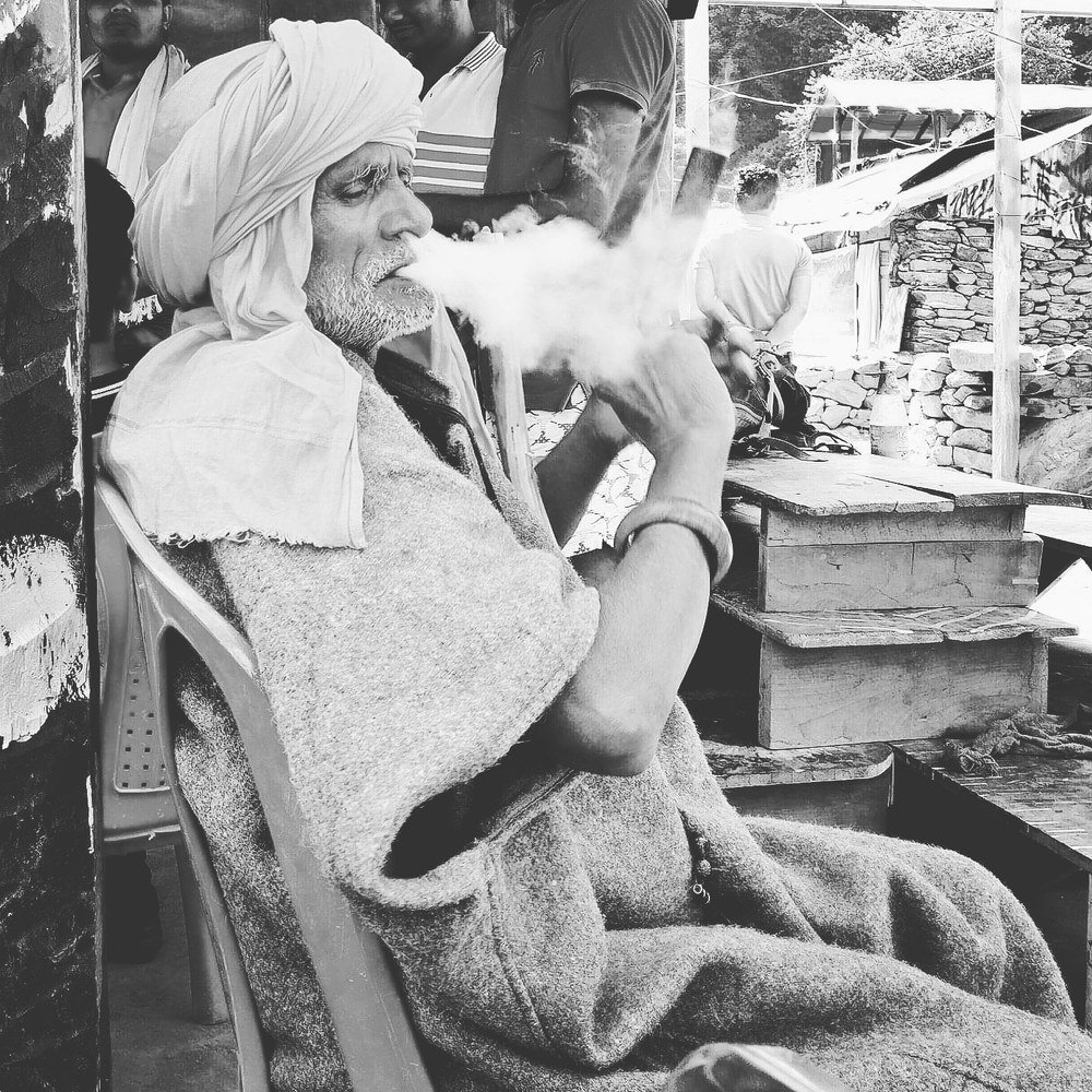 Captured this old man with his mood with chilam/sigar.