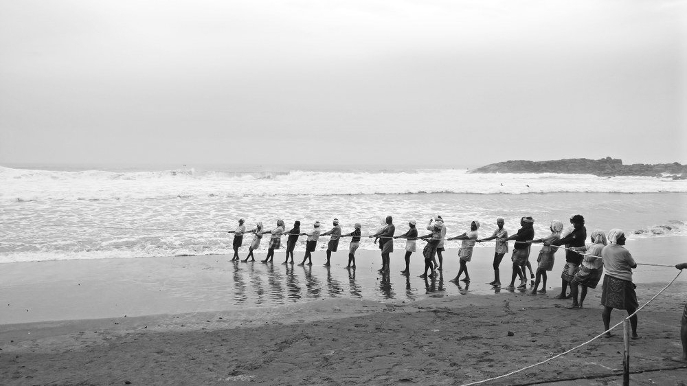 Captured daily work life of fishing guys team work.