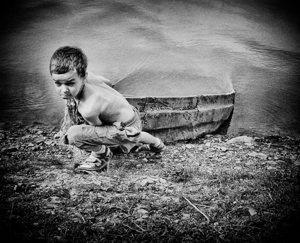 Мальчик и лодка