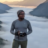 Ezekiel G. Mberu - фотограф