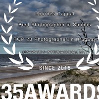 Lourdes Cajigal - фотограф